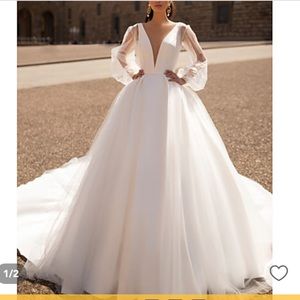Wedding gown - never been worn